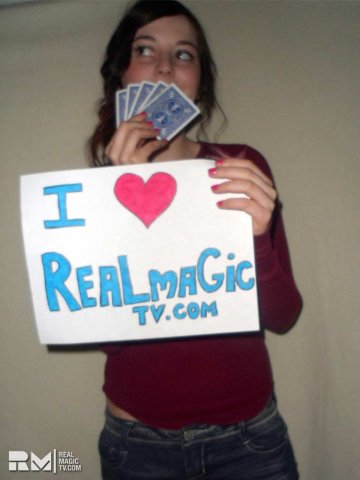 girl-with-playing-cards-and-rmtv-sign